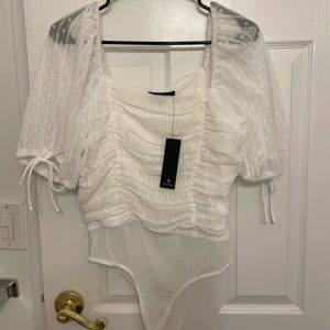 Brand New Lulu’s white bodysuit size M. Tags still on